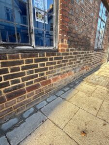 Brick wall with new pointing