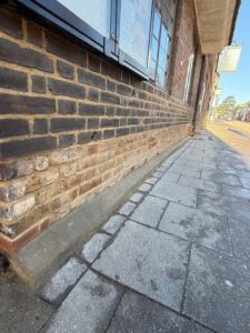 Brick wall with new pointing