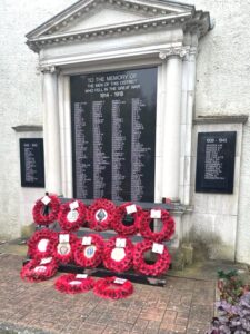 war memorial with poppy wreaths